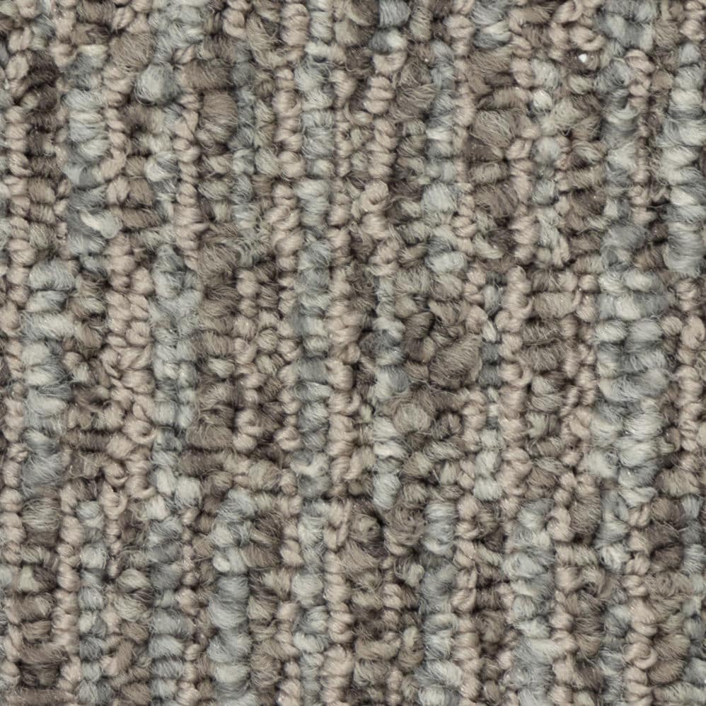 Close-up of textured gray and beige carpet fibers