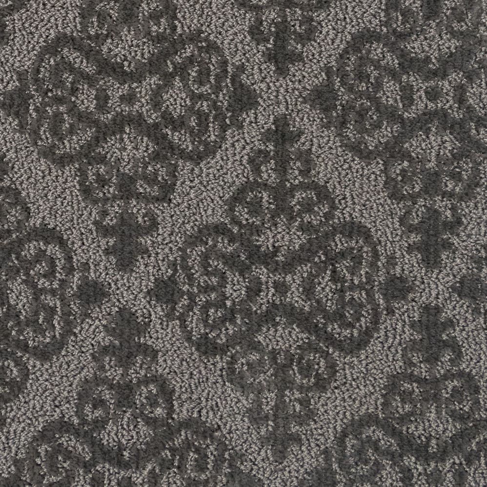 Gray patterned carpet with ornate floral design