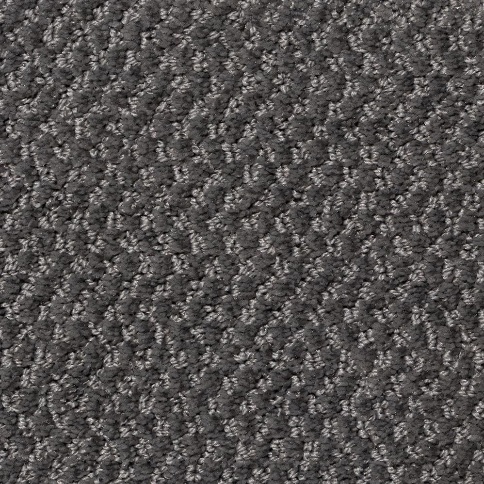 Close-up of dark gray textured carpet