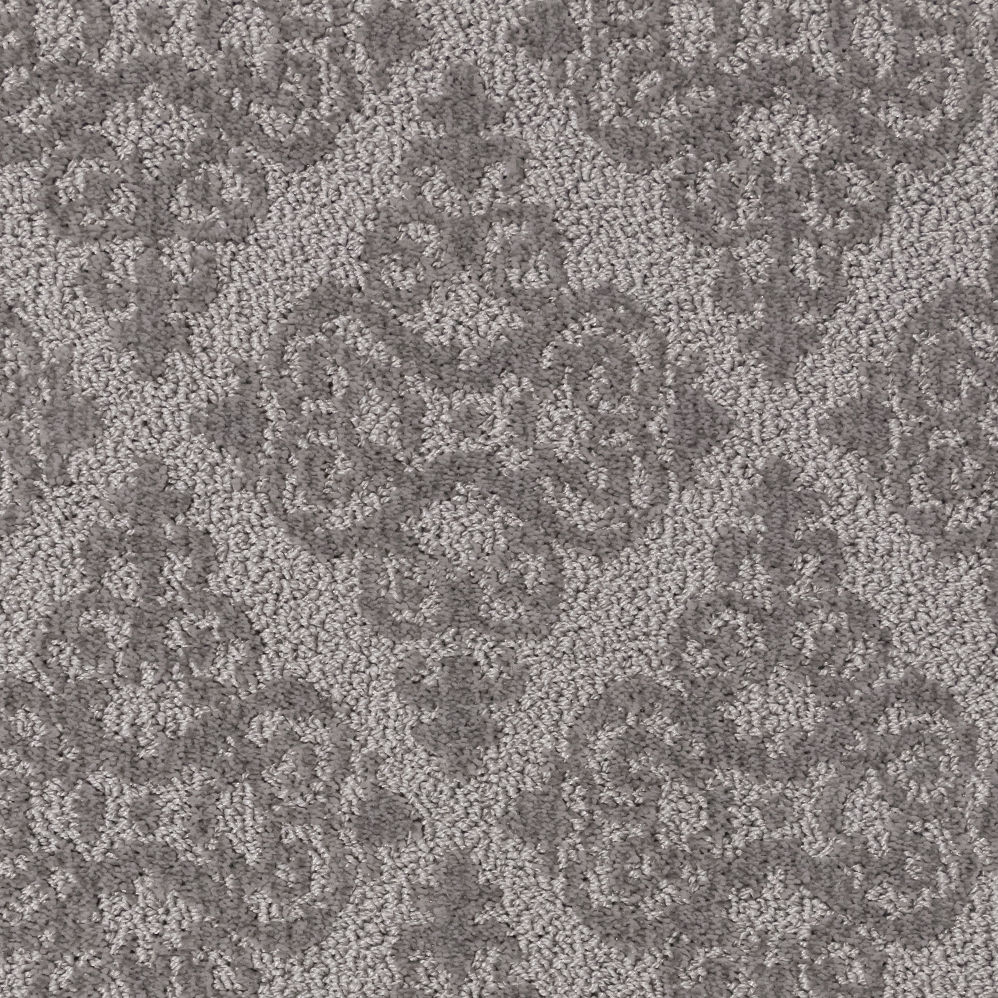 Gray patterned carpet with subtle floral design