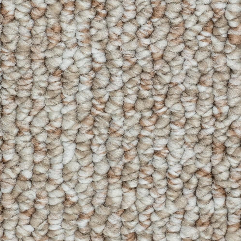 Close-up of beige loop pile carpet texture