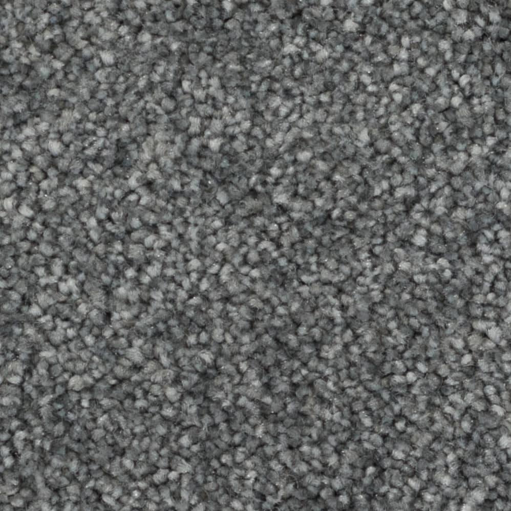 Close-up of gray textured carpet fibers