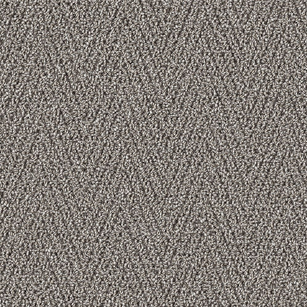Close-up of textured gray carpet fibers