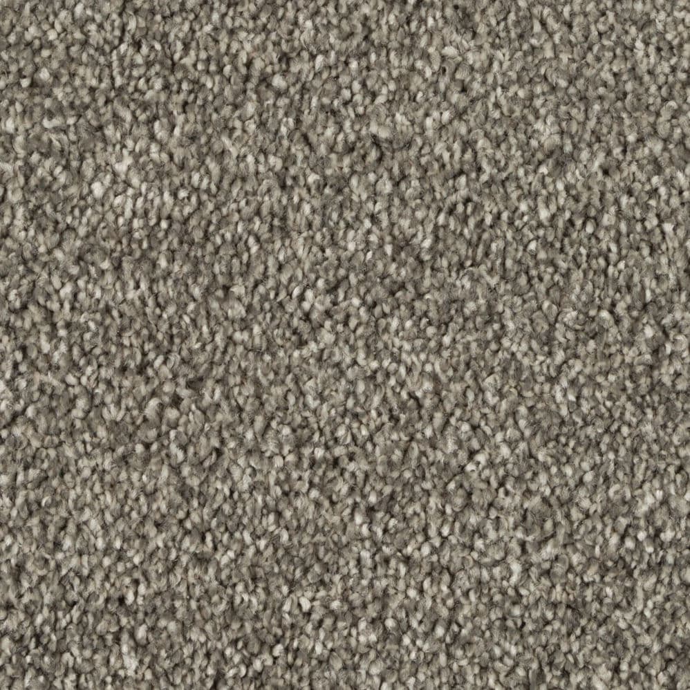 Close-up of gray textured carpet fibers