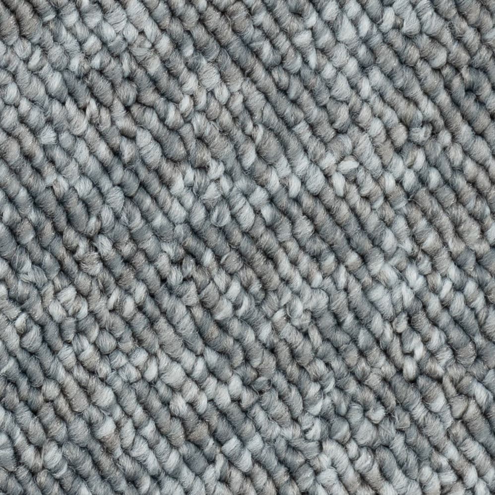 Close-up of gray textured carpet fibers