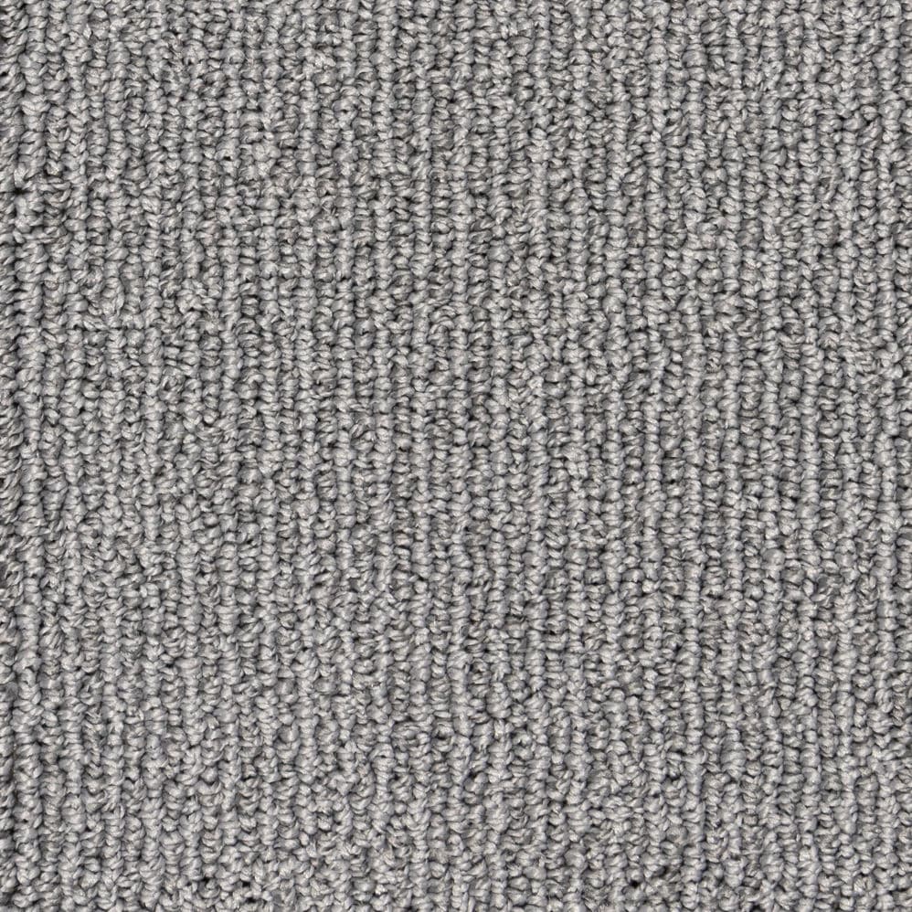 Close-up of gray textured loop carpet