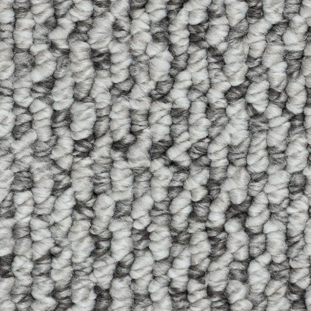 Close-up of gray textured carpet fibers