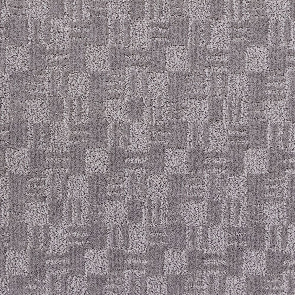 Gray textured carpet with geometric square pattern