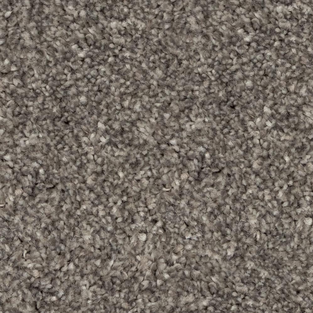 Close-up of gray textured carpet fibers