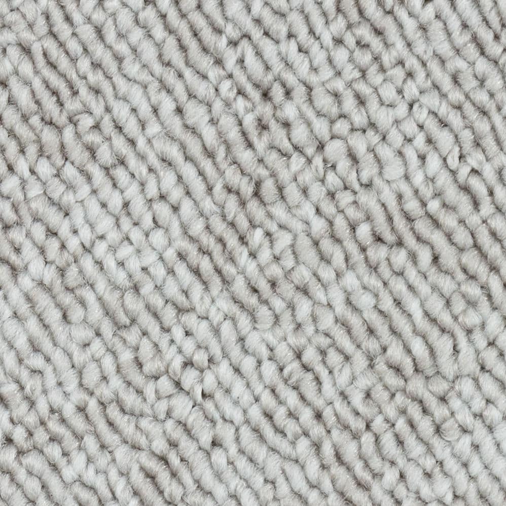 Close-up of light gray textured carpet fibers