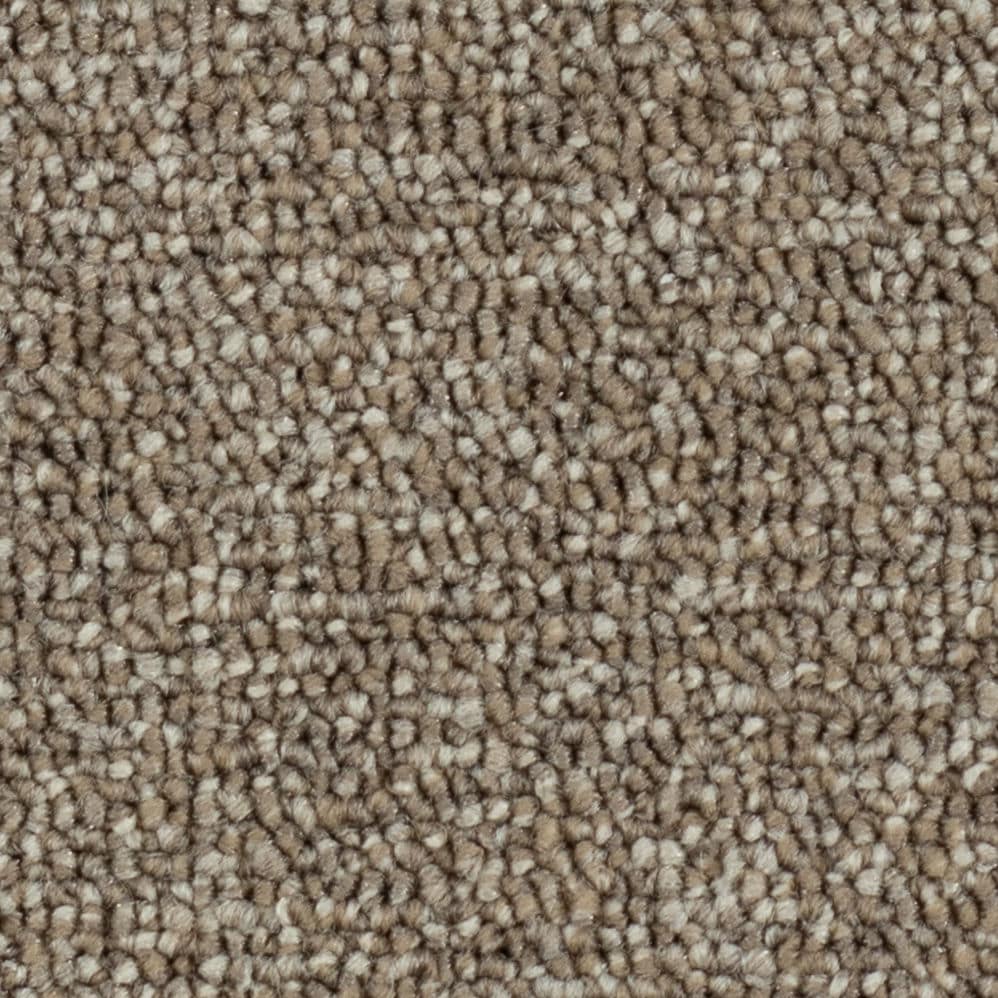 Close-up of beige textured carpet fibers