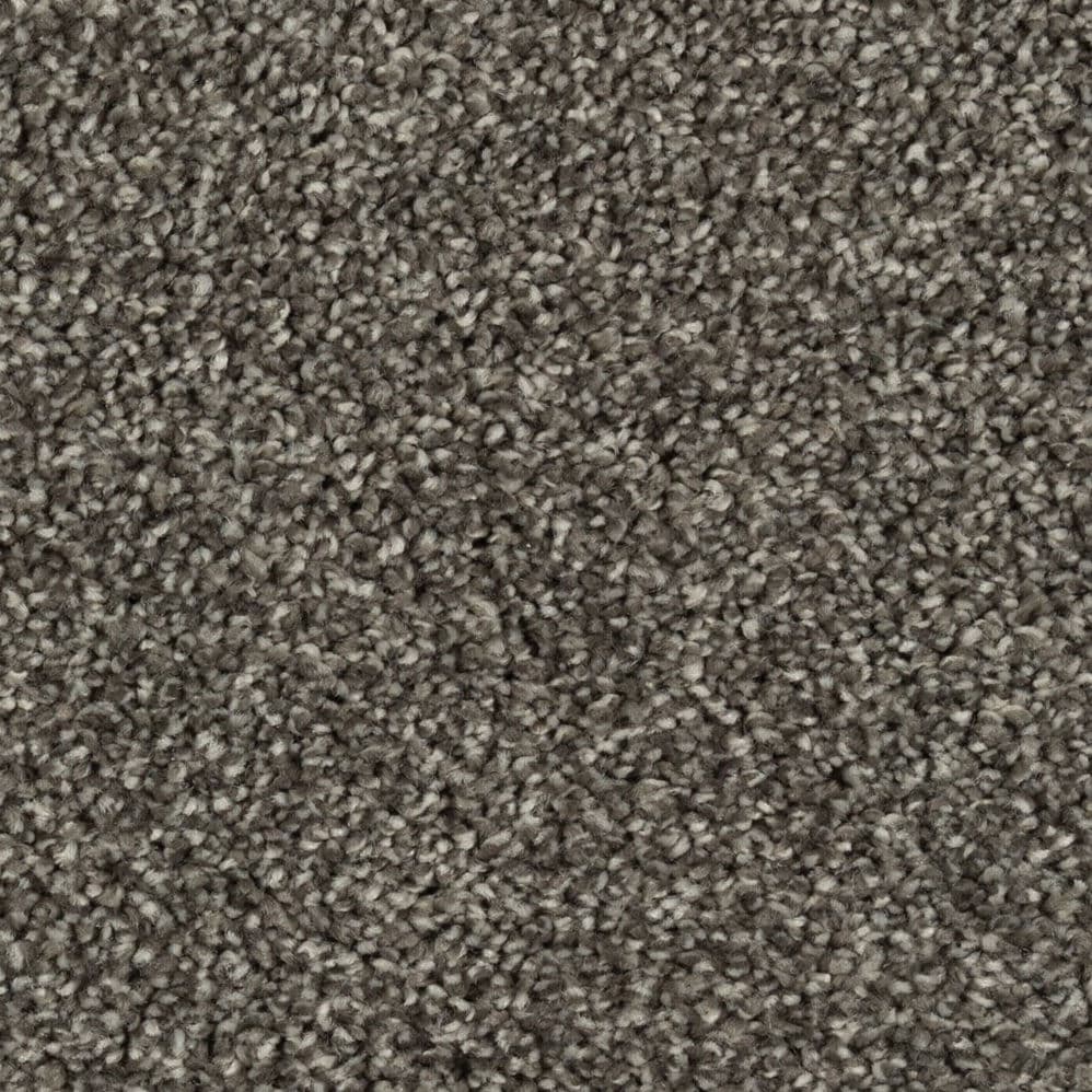 Close-up of gray textured carpet fibers