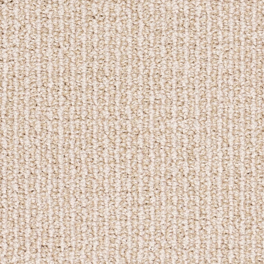 Close-up of beige textured carpet surface