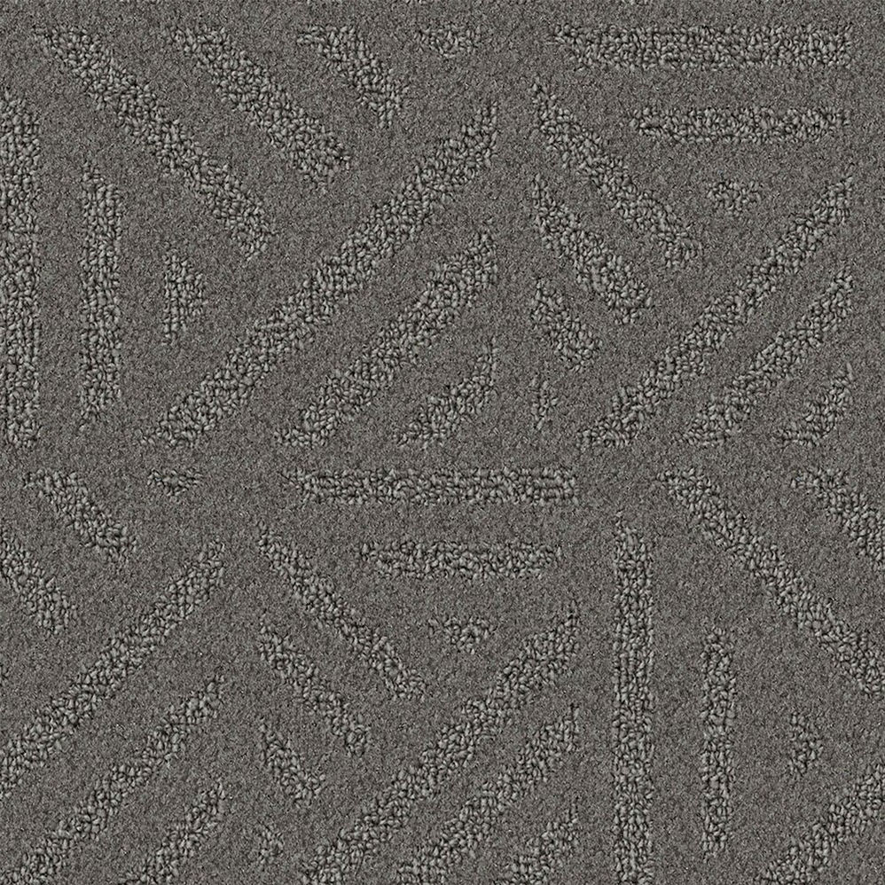 Gray textured carpet with abstract geometric pattern