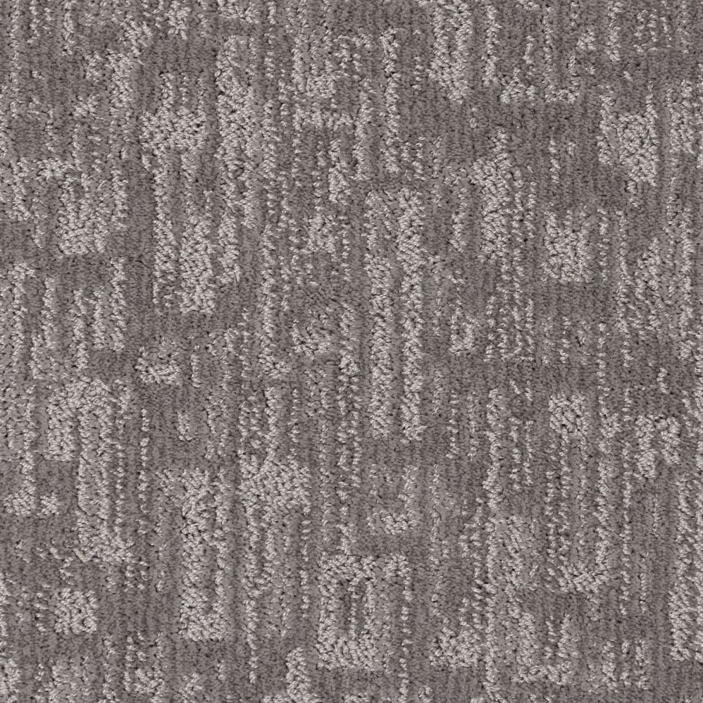 Close-up of textured gray patterned carpet