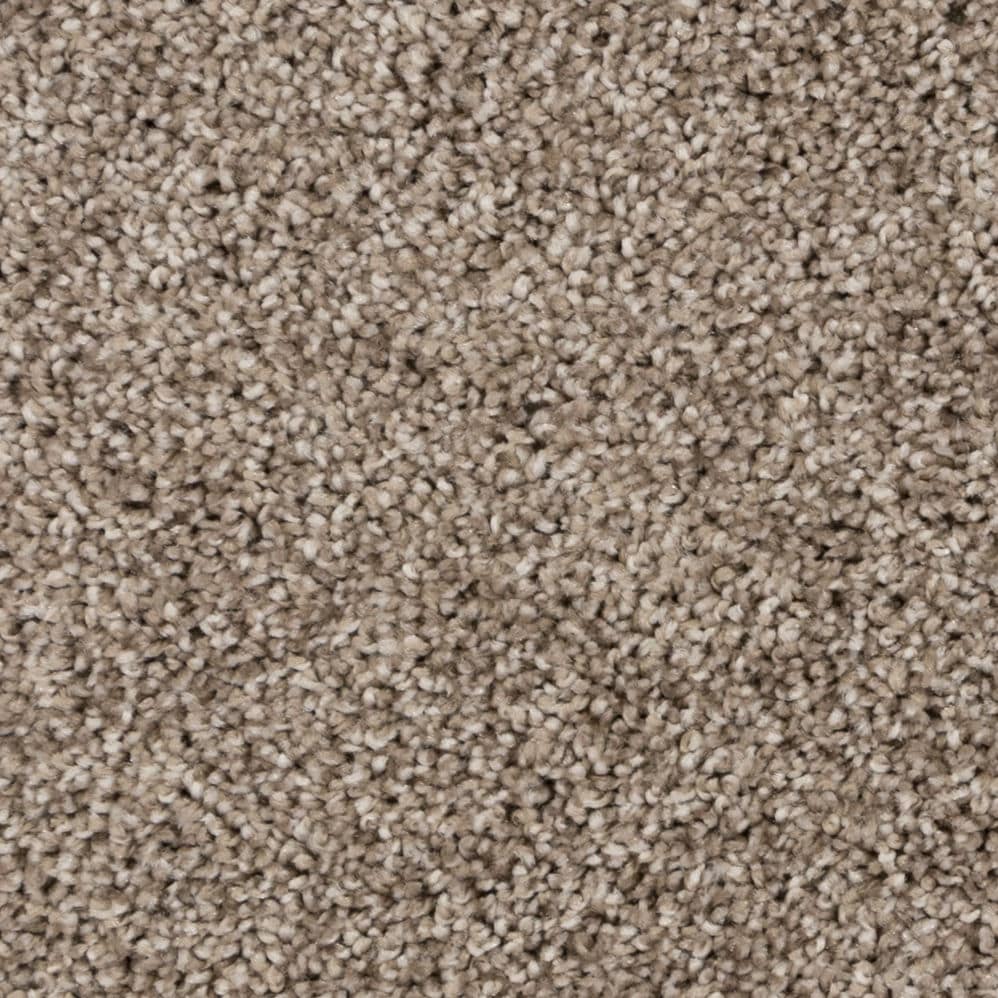 Close-up of beige textured carpet surface