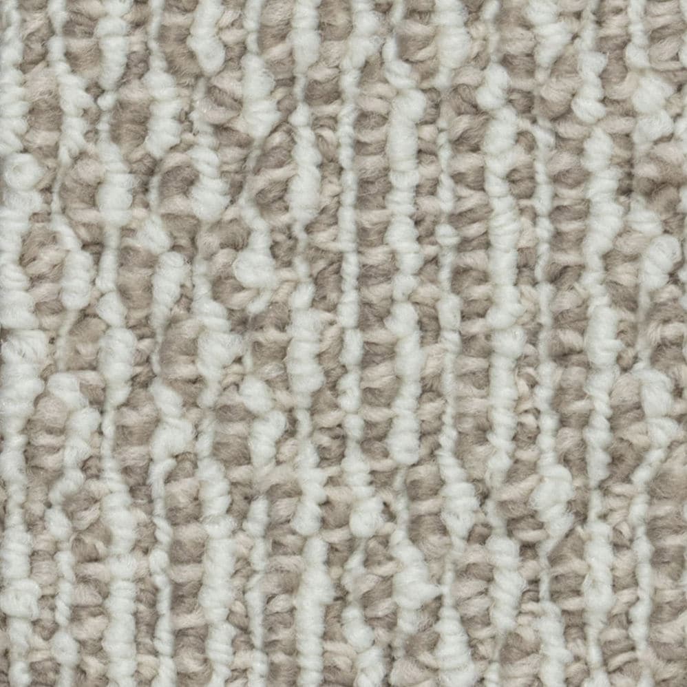 Close-up of beige and white textured carpet