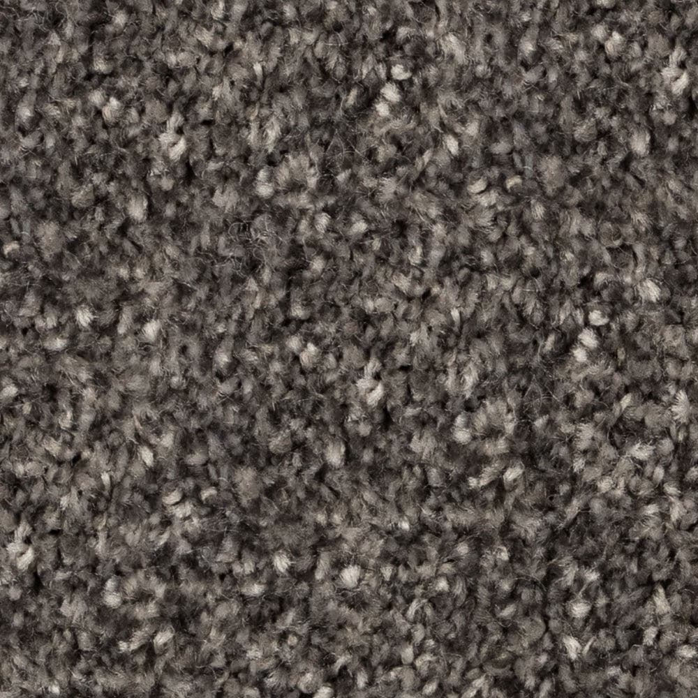 Close-up of gray textured carpet fibers