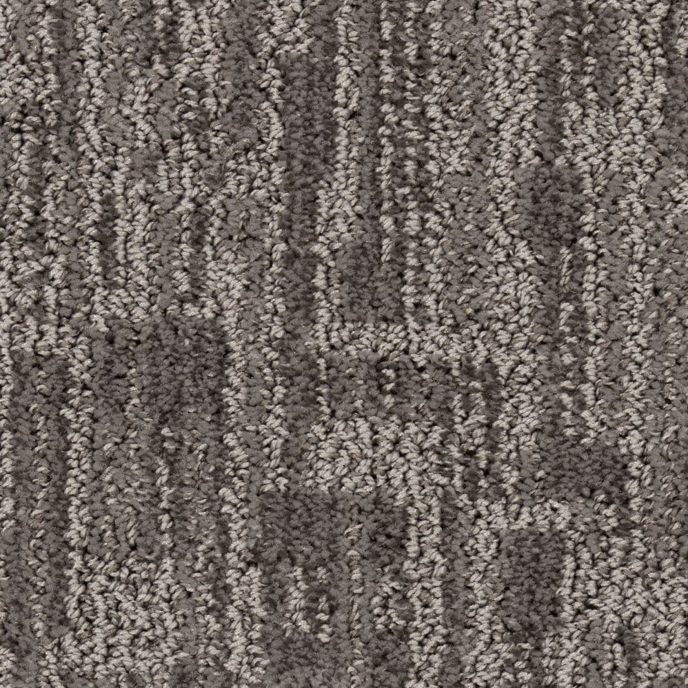 Close-up of textured gray patterned carpet
