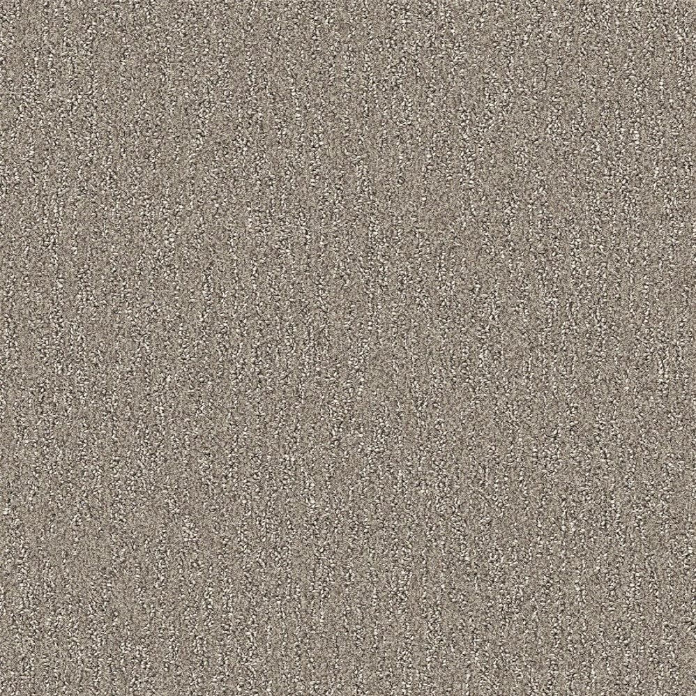Close-up of beige textured carpet surface