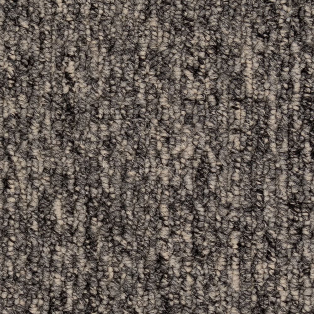 Close-up of textured gray and brown carpet