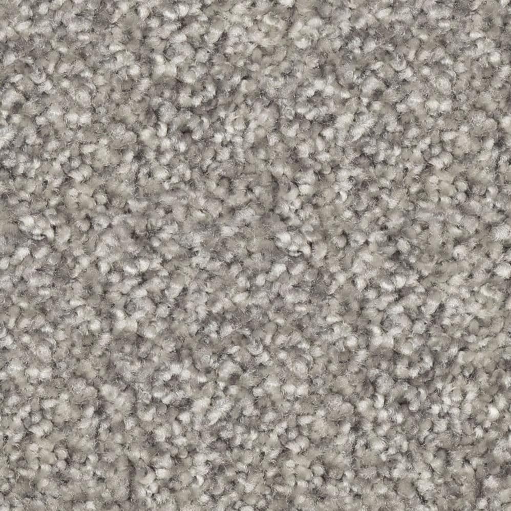 Close-up of gray textured carpet fibers