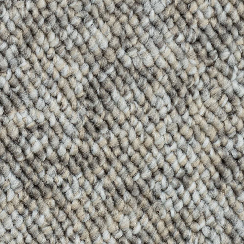 Close-up of textured beige loop carpet