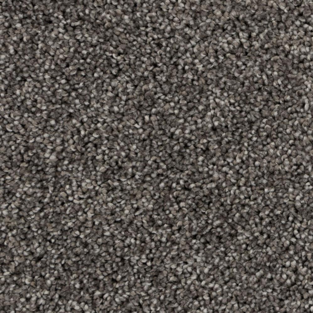 Close-up of gray textured carpet fibers