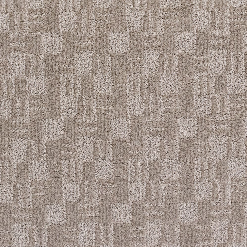 Beige textured carpet with subtle geometric pattern