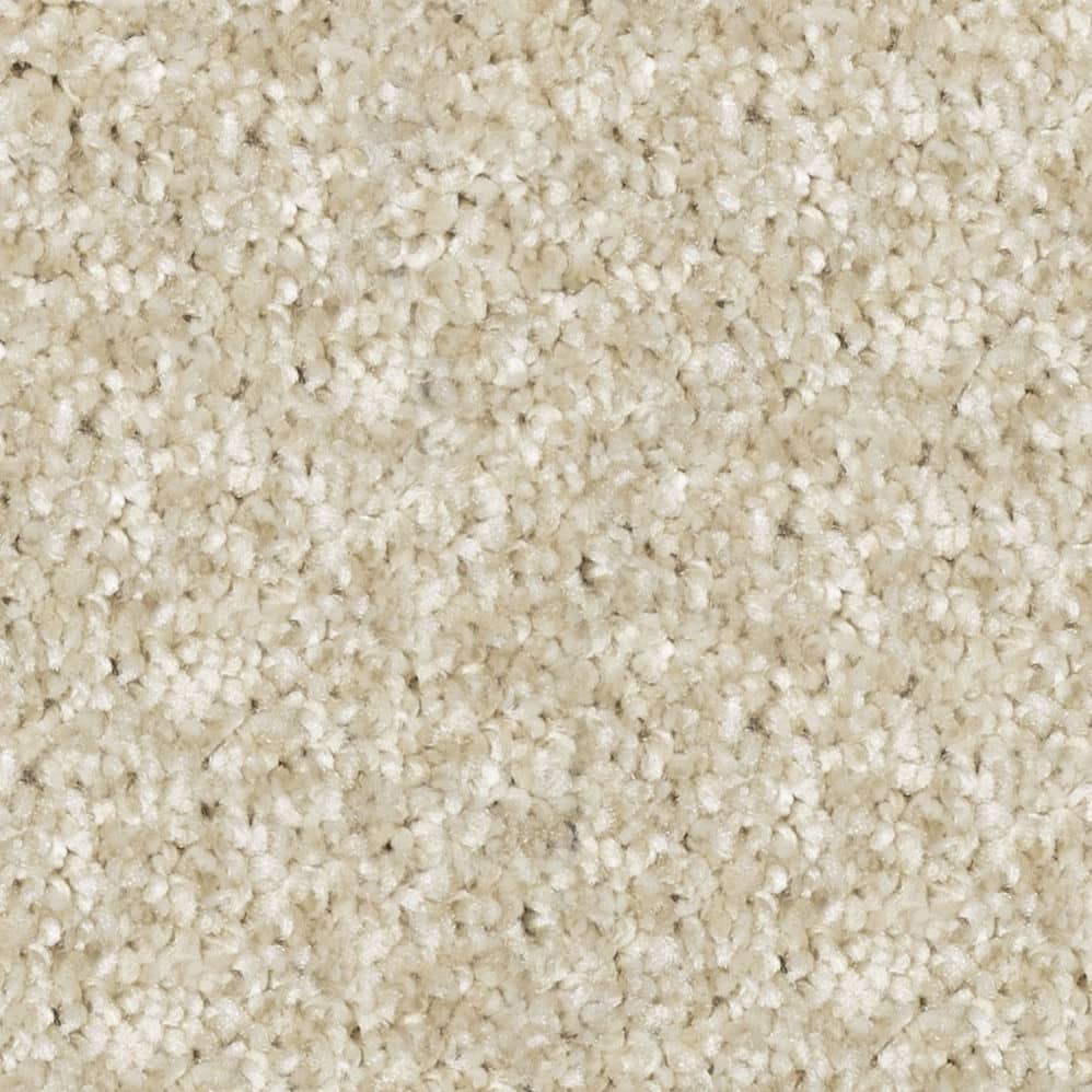 Close-up of beige textured carpet surface