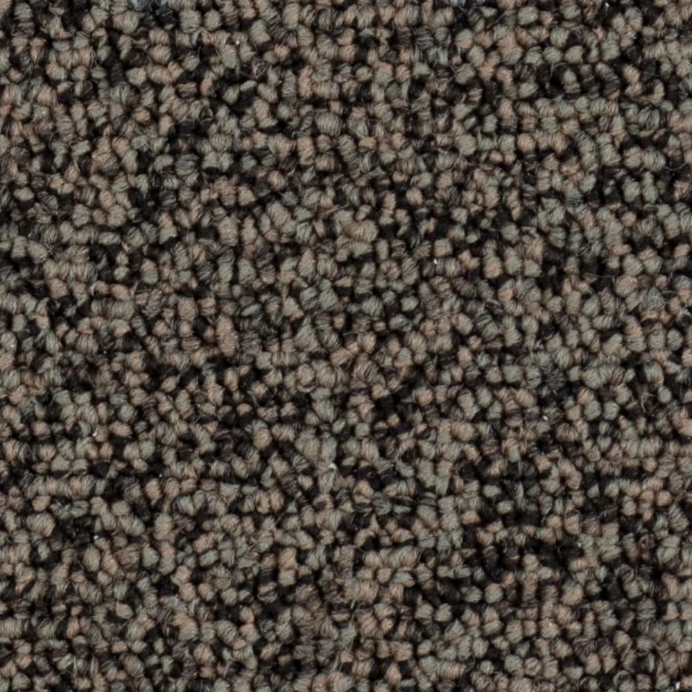 Close-up of brown textured carpet fibers
