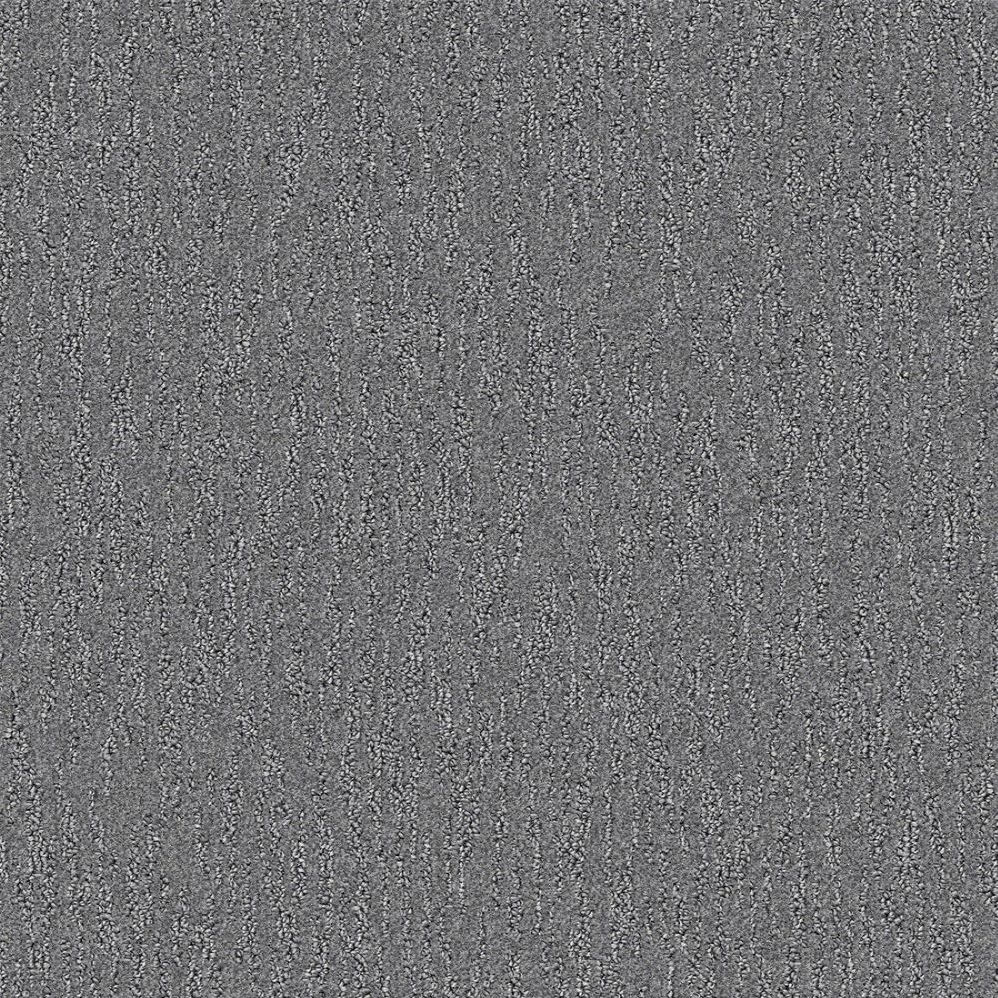 Gray textured carpet surface with subtle vertical pattern