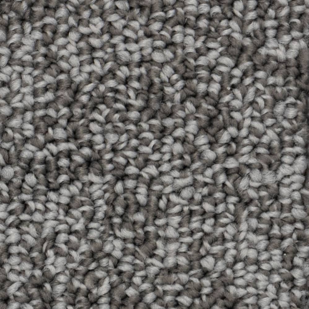 Close-up of gray textured carpet fibers