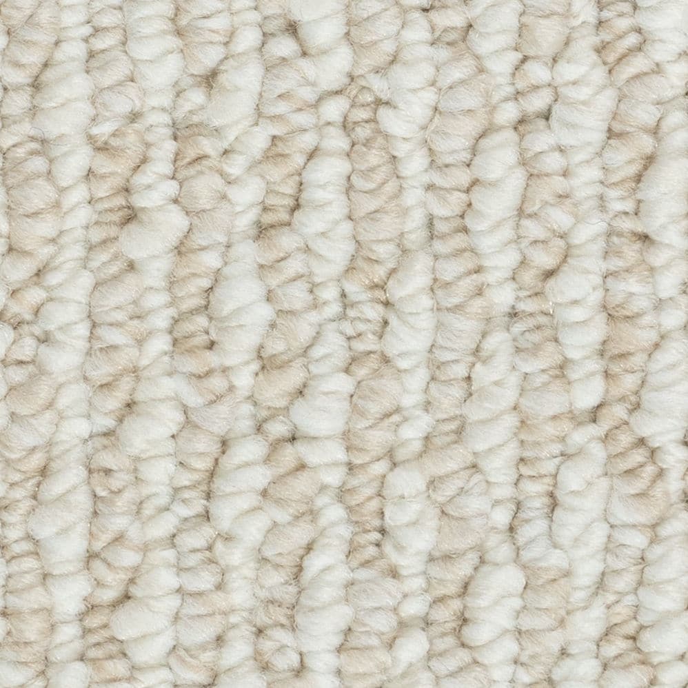 Close-up of cream textured wool carpet