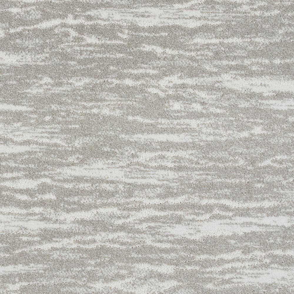 Light gray textured carpet surface