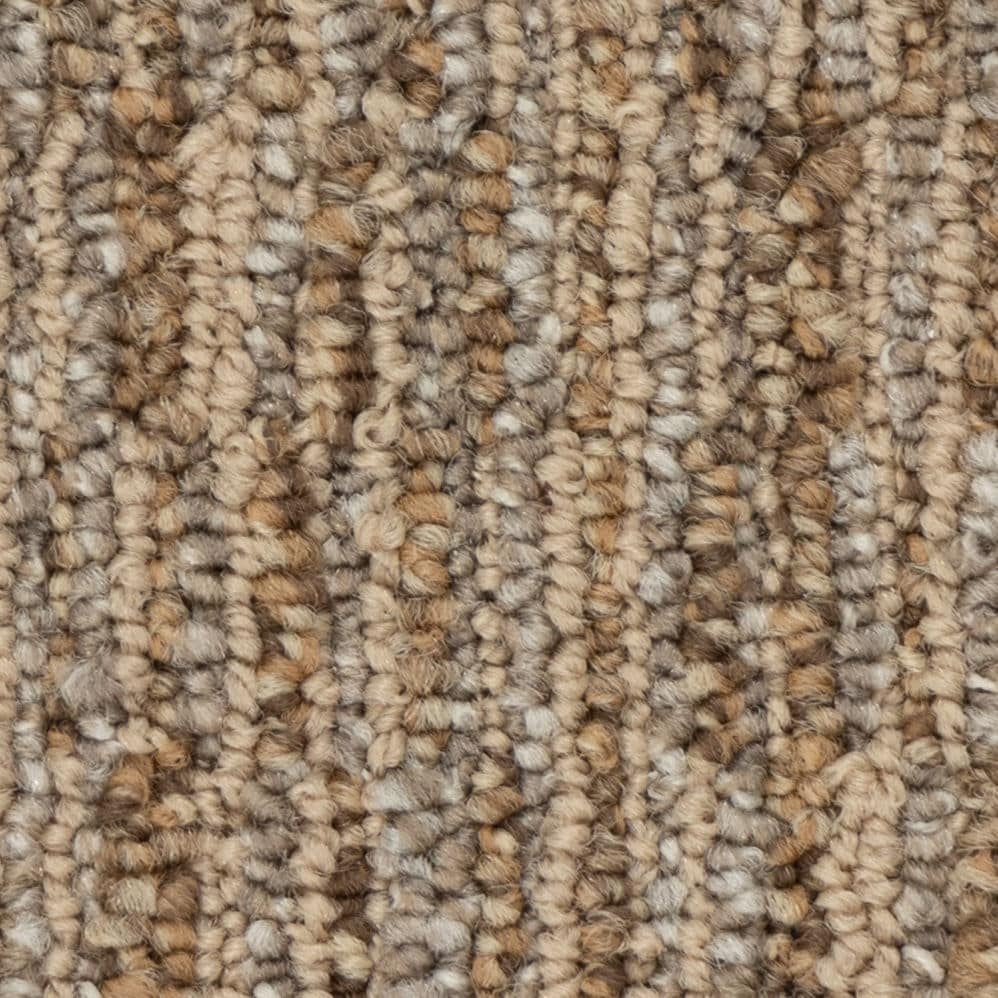 Close-up of beige textured carpet fibers