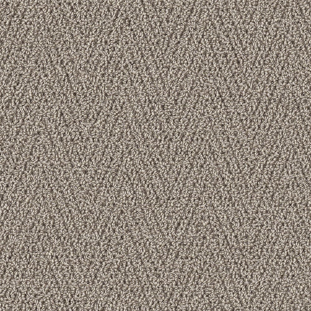 Close-up of beige textured carpet surface