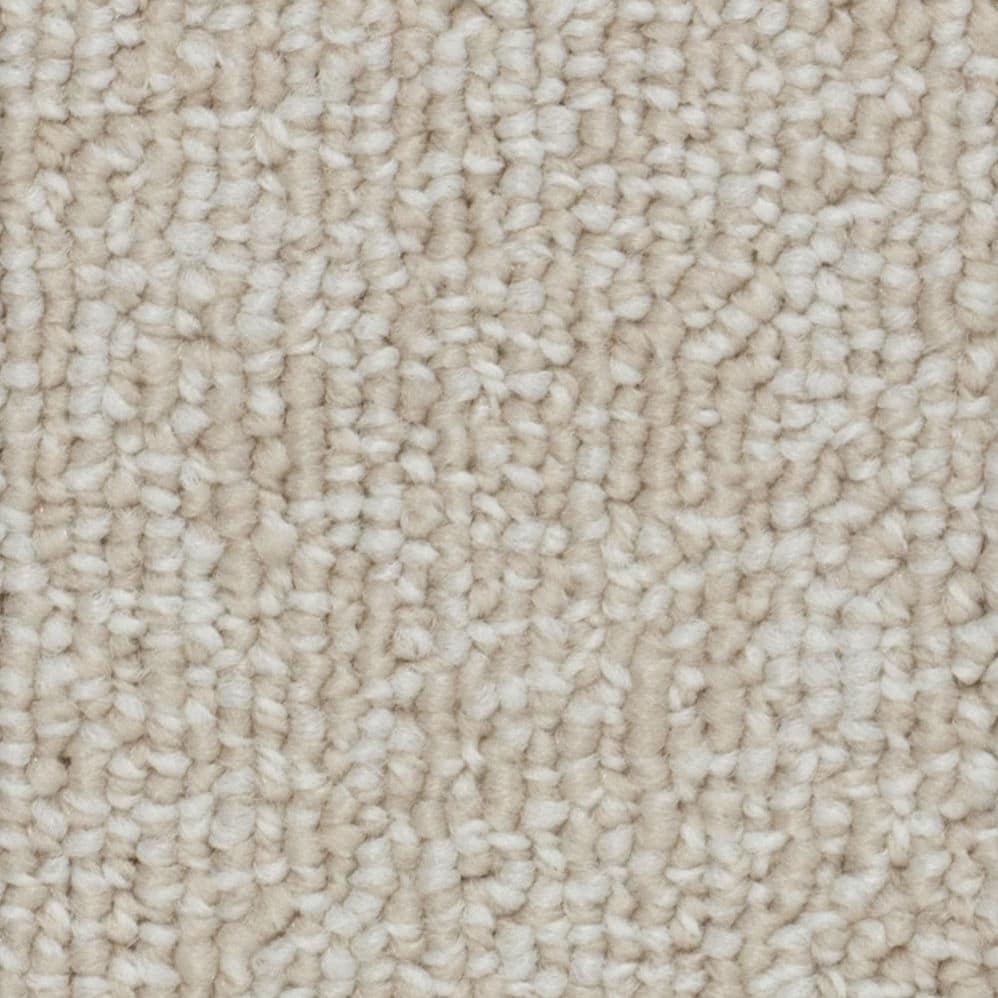 Close-up of beige textured carpet fibers