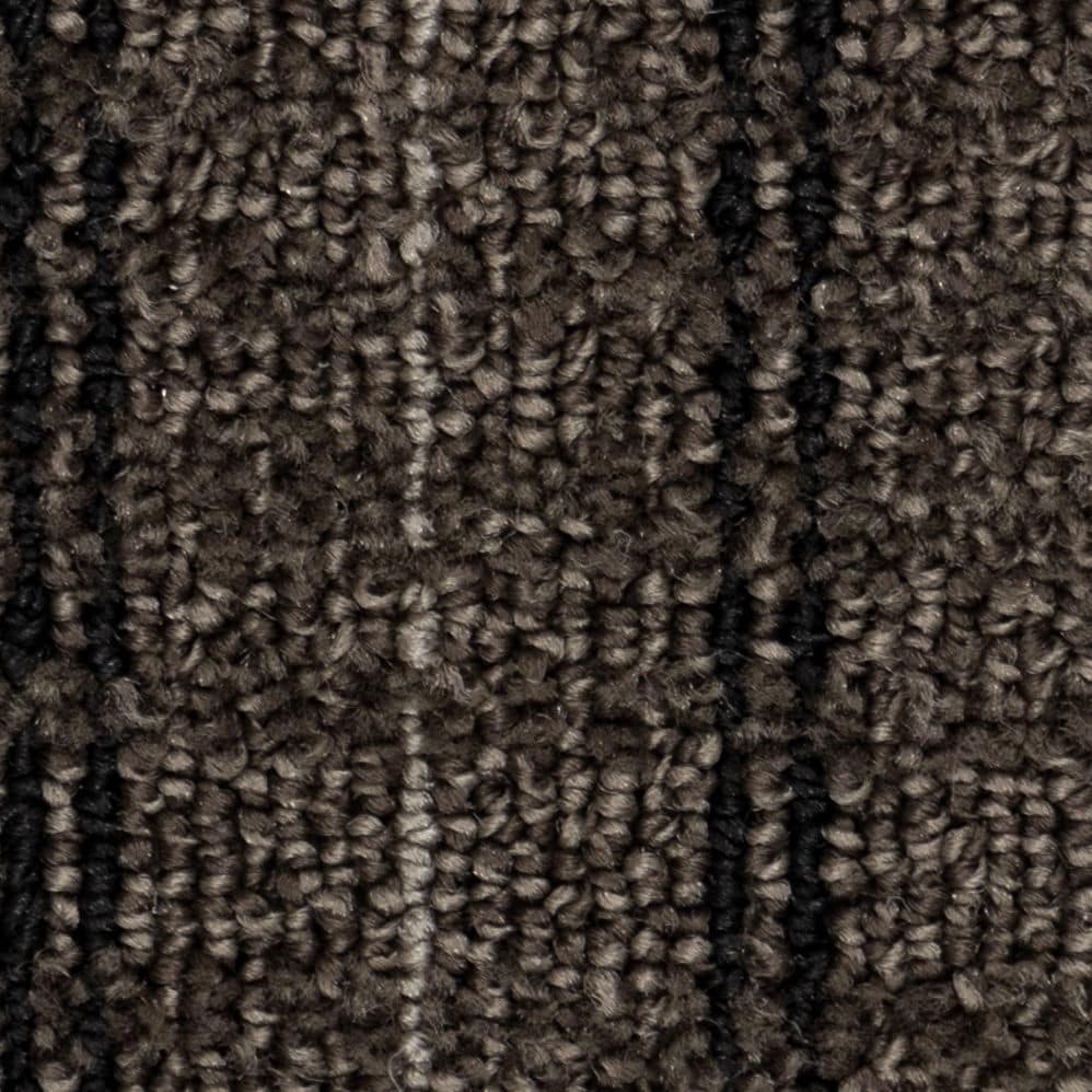 Close-up of brown textured carpet with dark stripes