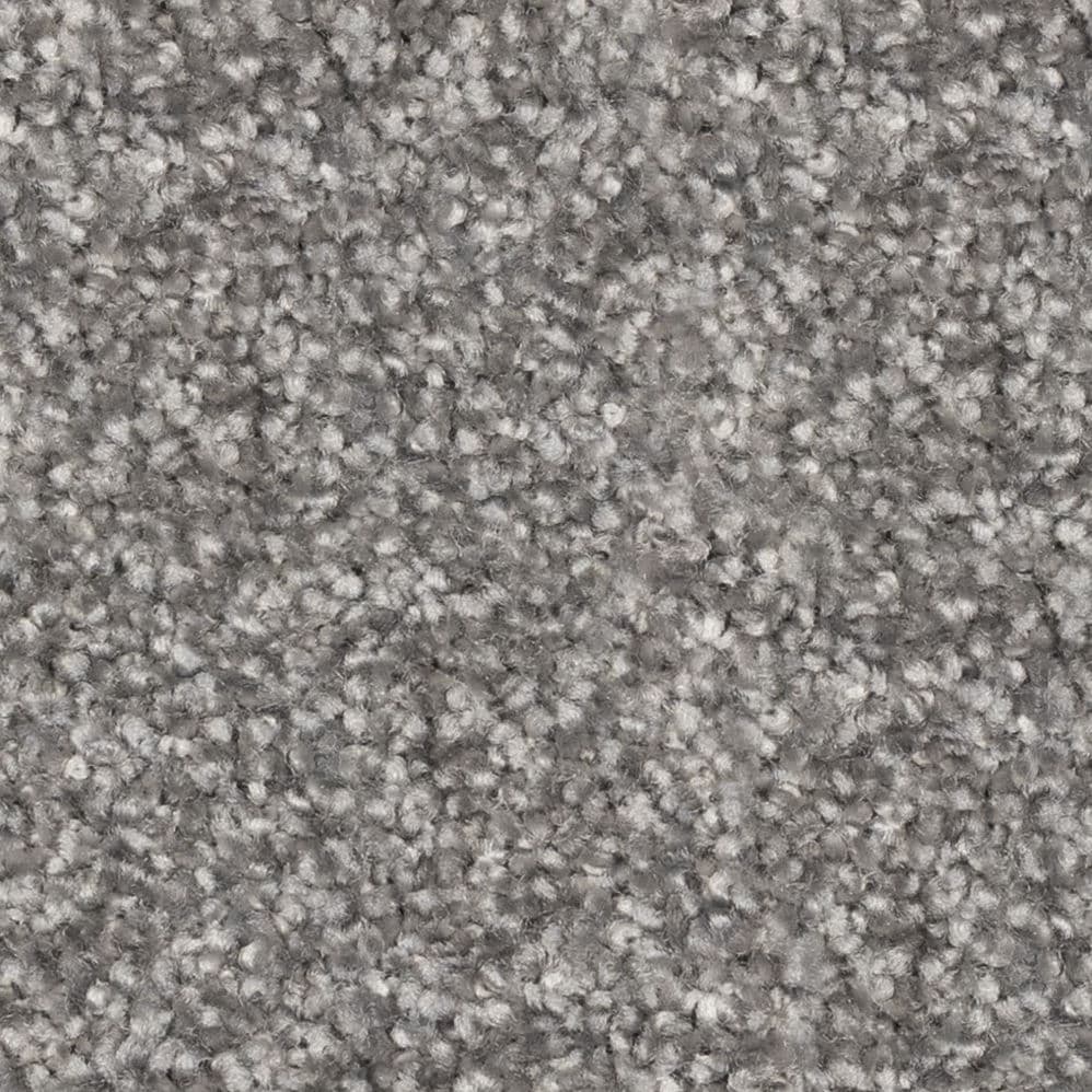 Close-up of gray textured carpet fibers