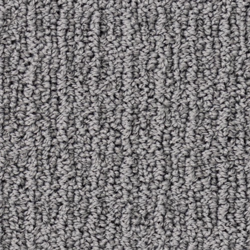 Close-up of gray textured carpet fibers