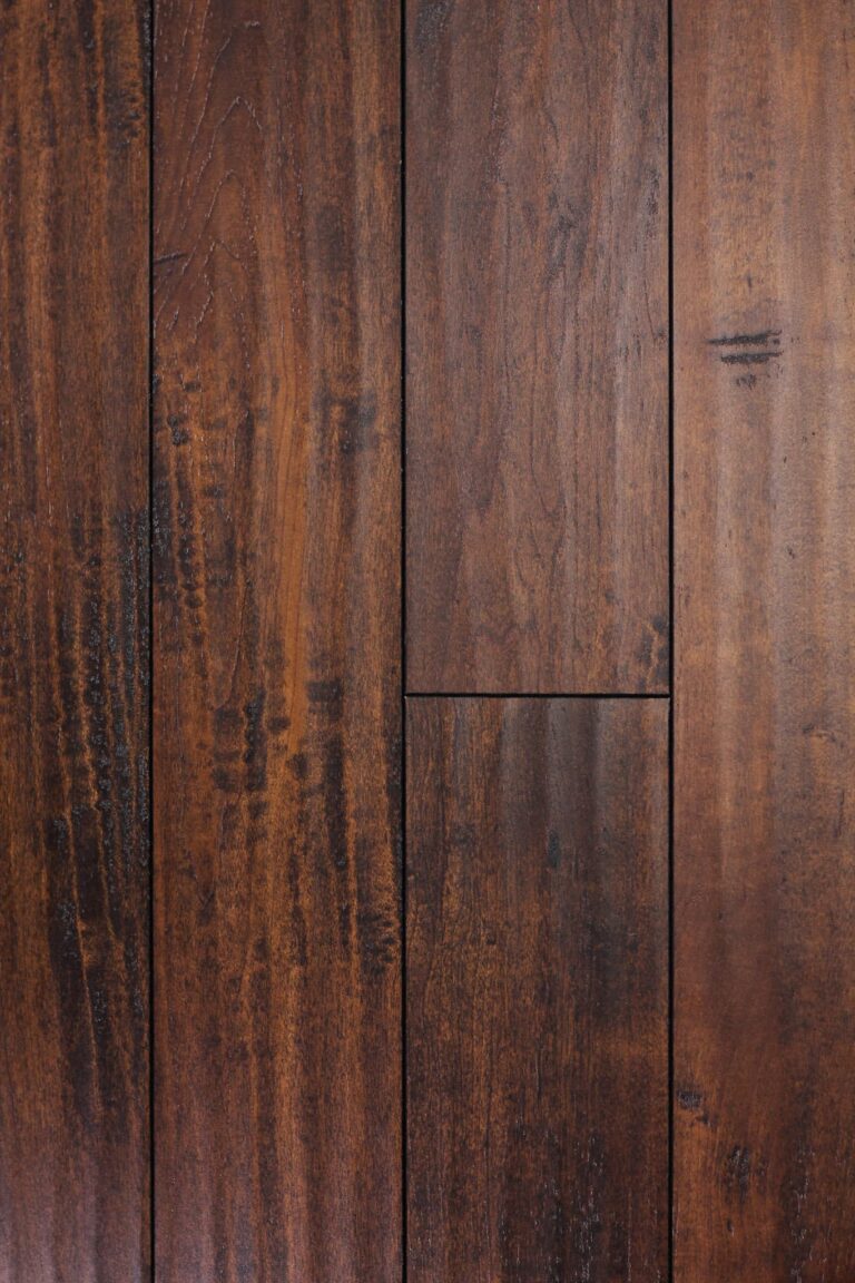 Dark brown wooden floor planks close-up texture