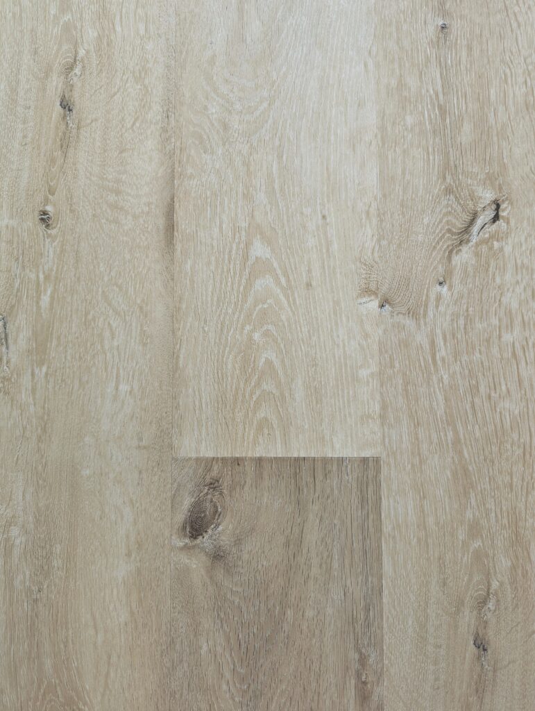 Light oak wood flooring with natural knots.